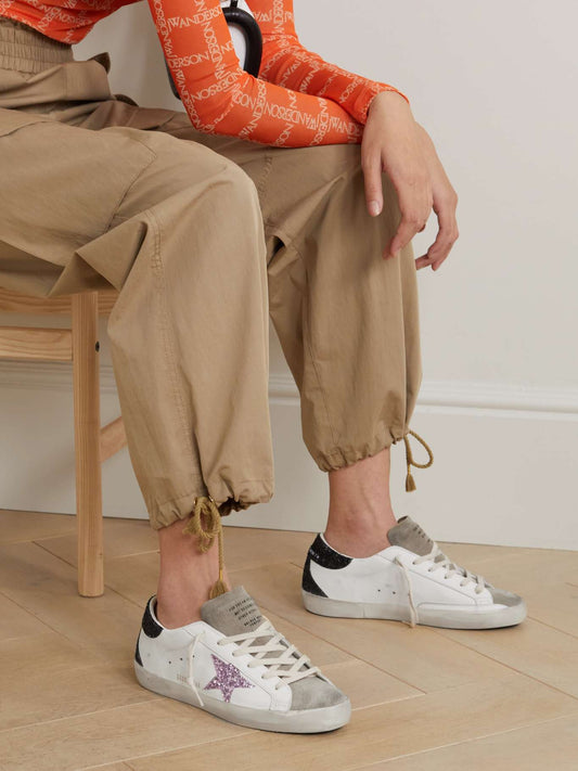 GOLDEN GOOSE
Superstar distressed glittered leather sneakers