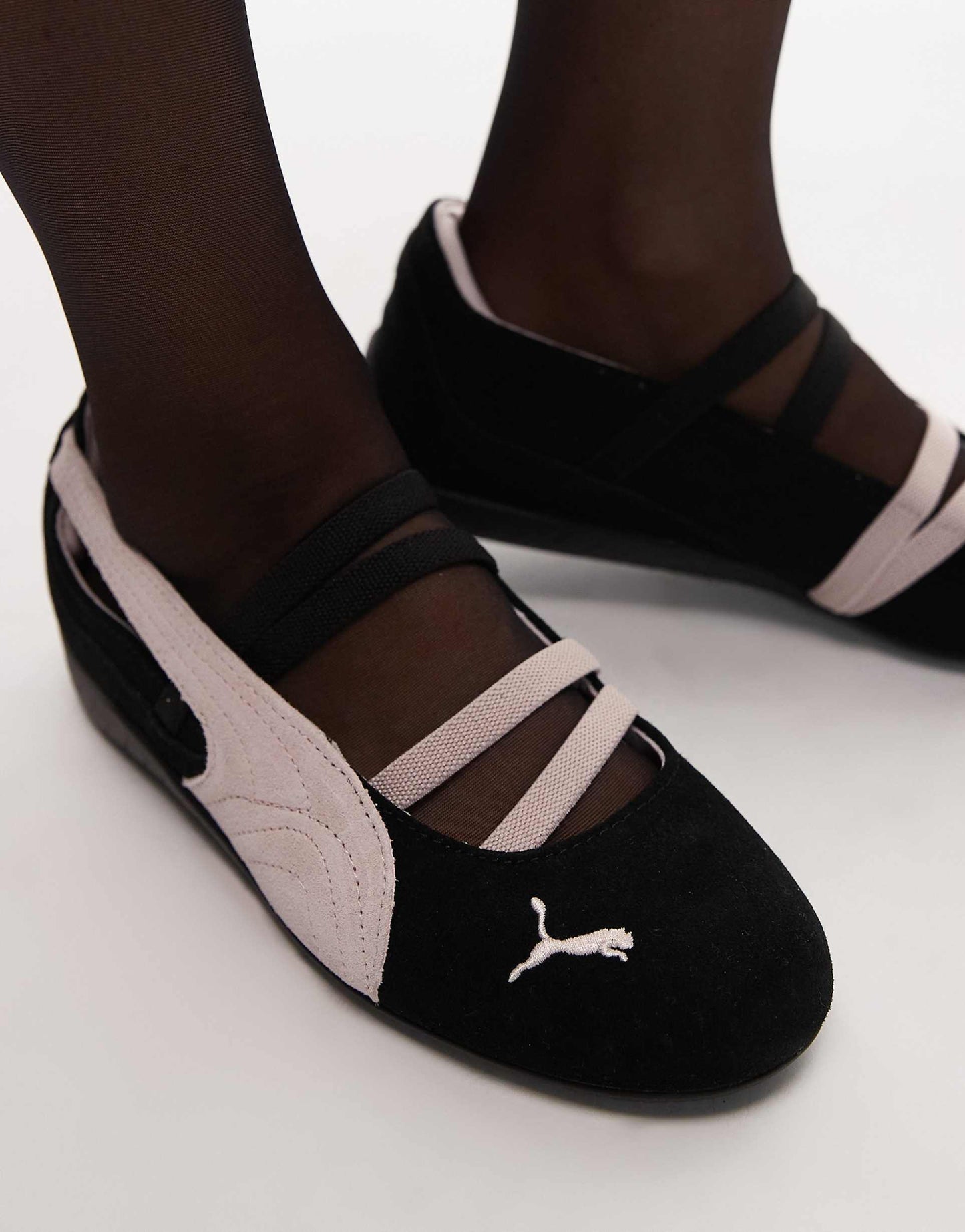 Puma Speedcat ballet flats in black and pink